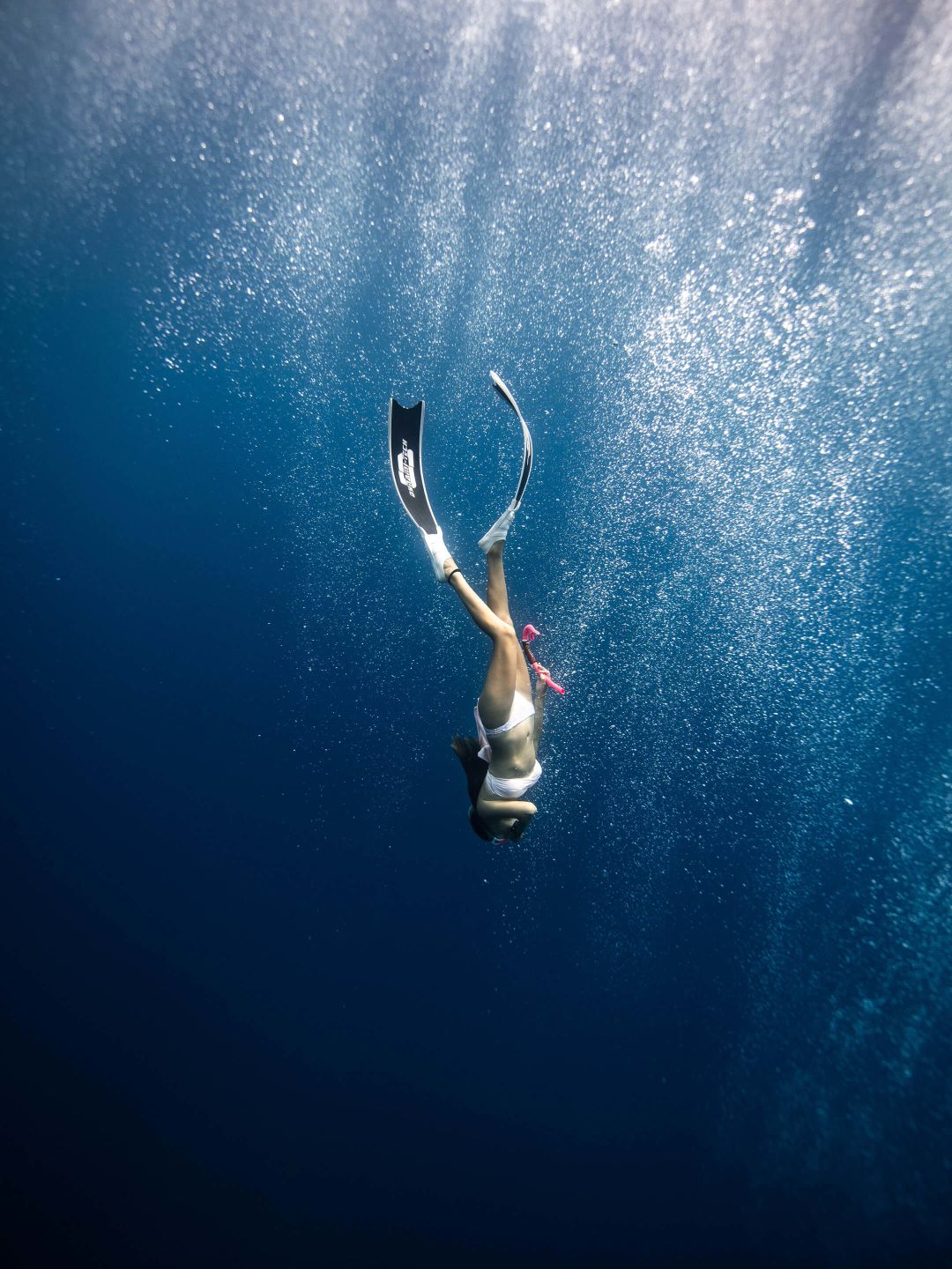 A Person Swimming In The Water