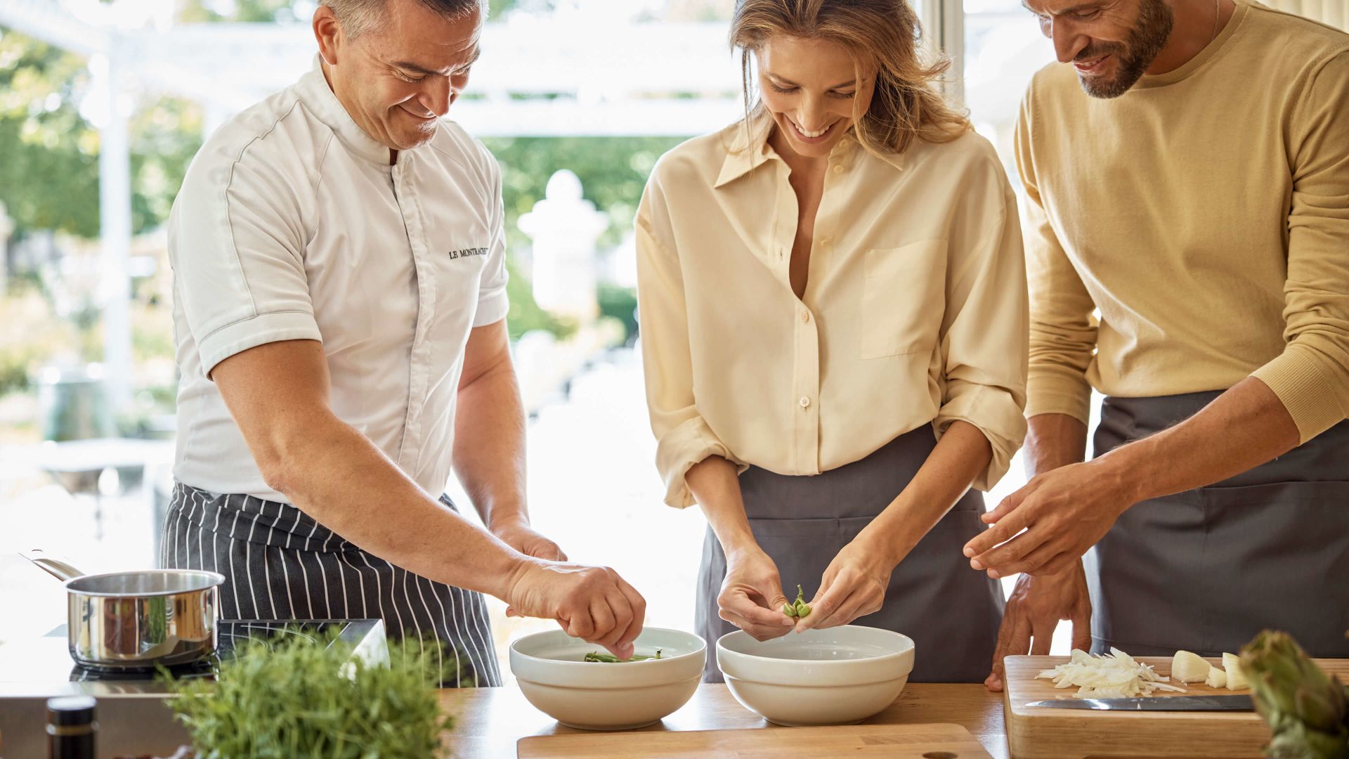 A Group Of People Cooking
