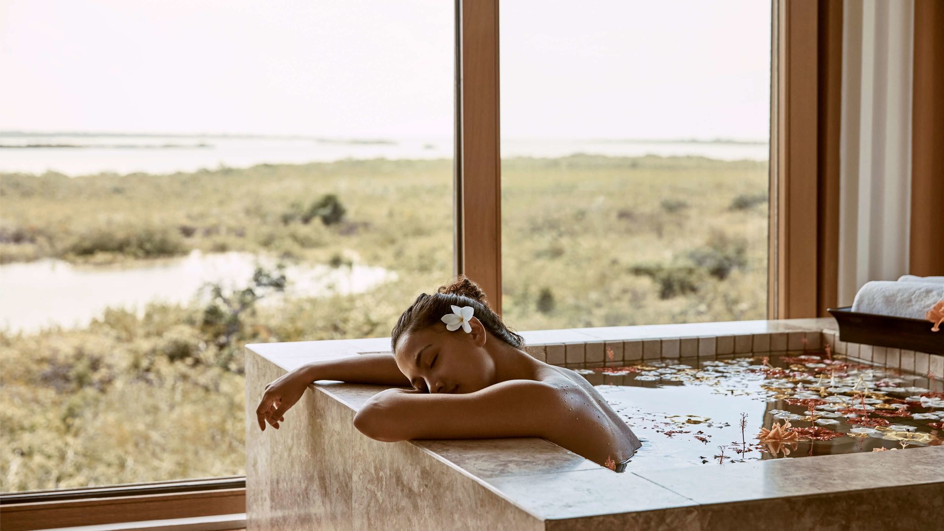 A Person Lying On A Window Ledge
