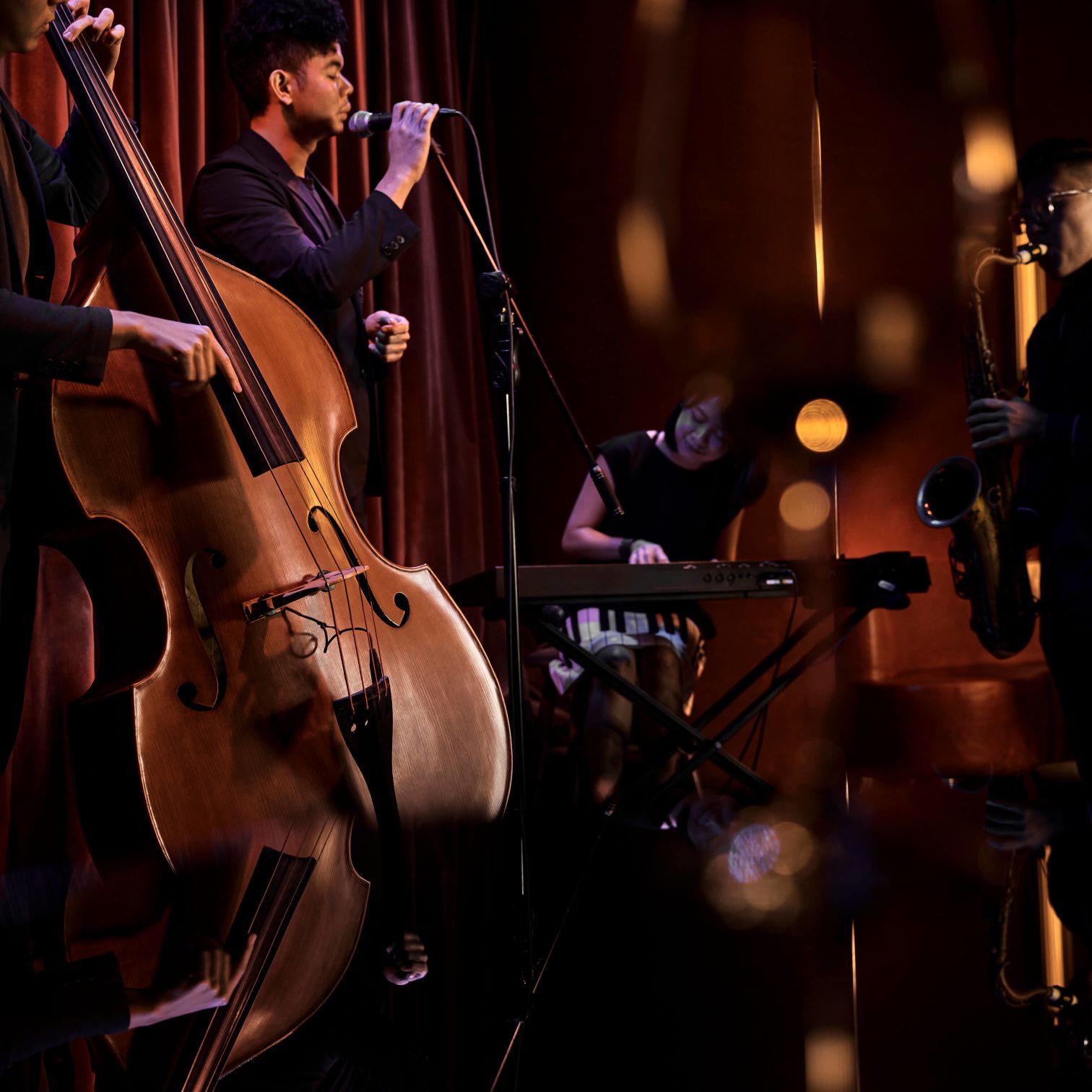 A Person Playing A Cello
