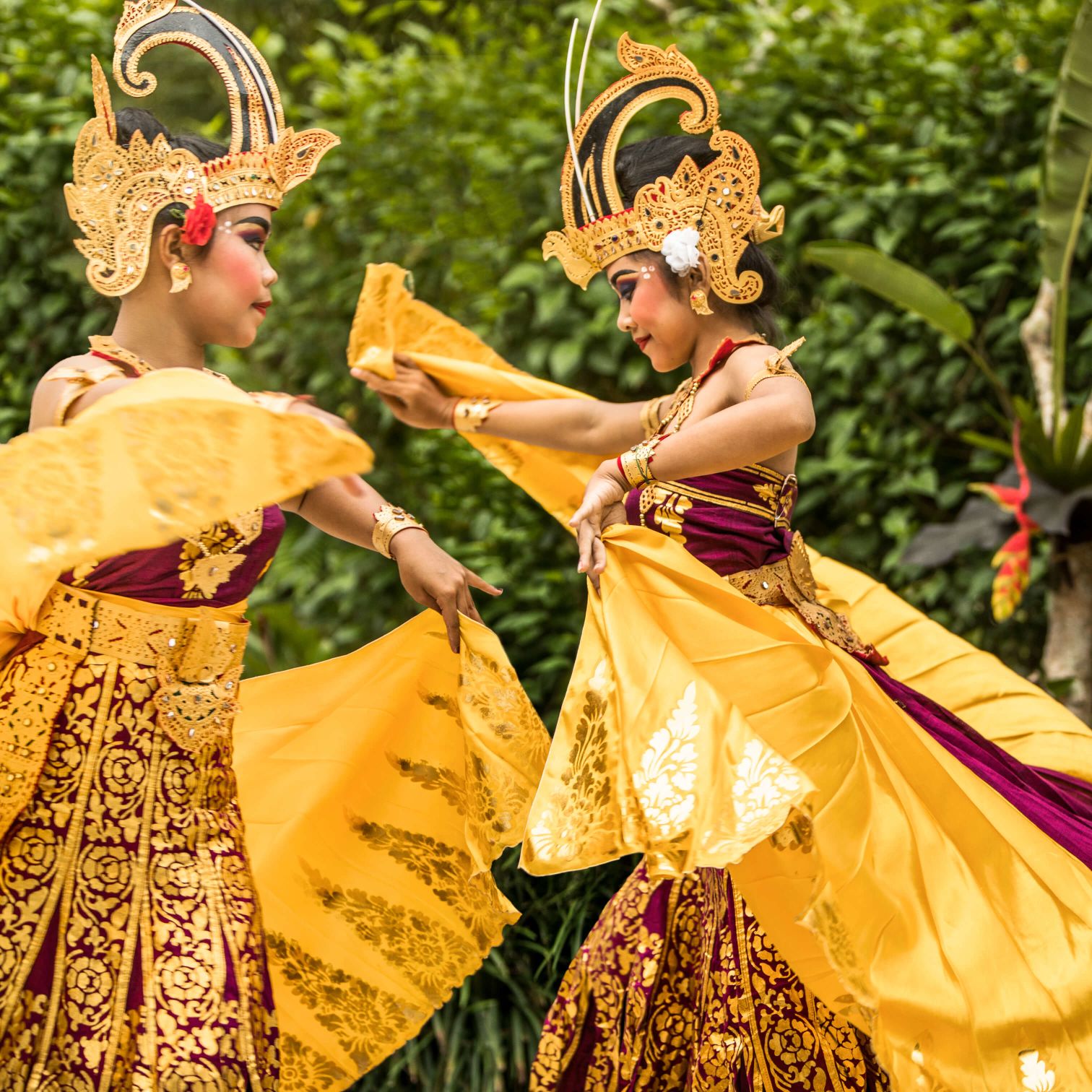 A Couple Of Women Wearing Traditional Clothing