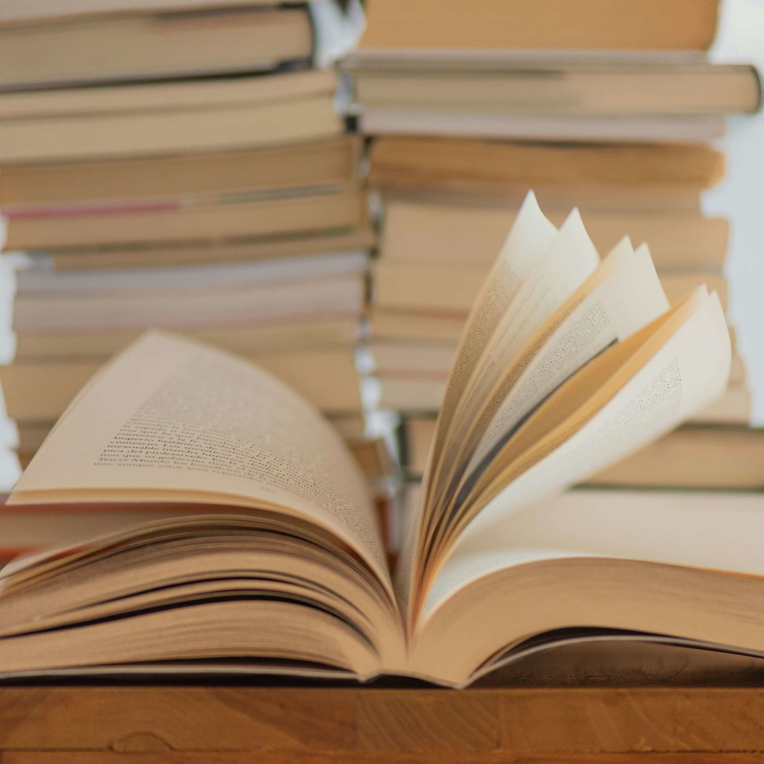 A Book Open On A Table