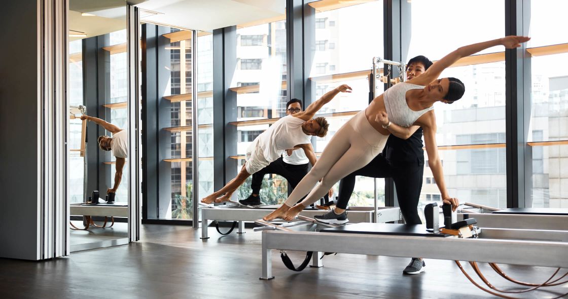 A Group Of People Exercising
