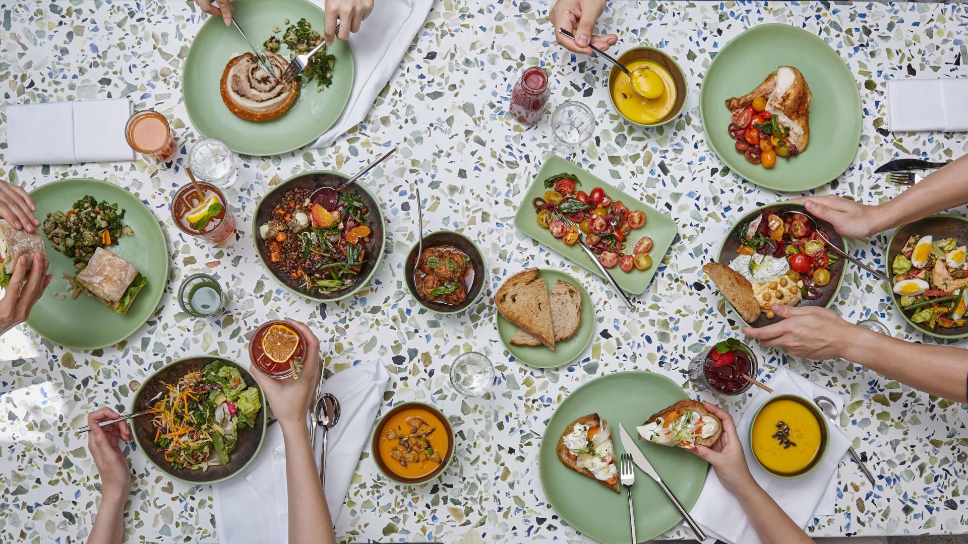 A Group Of People Eating Food
