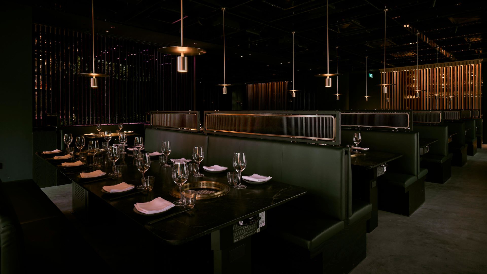 A Bar With A Large Bar And Chairs