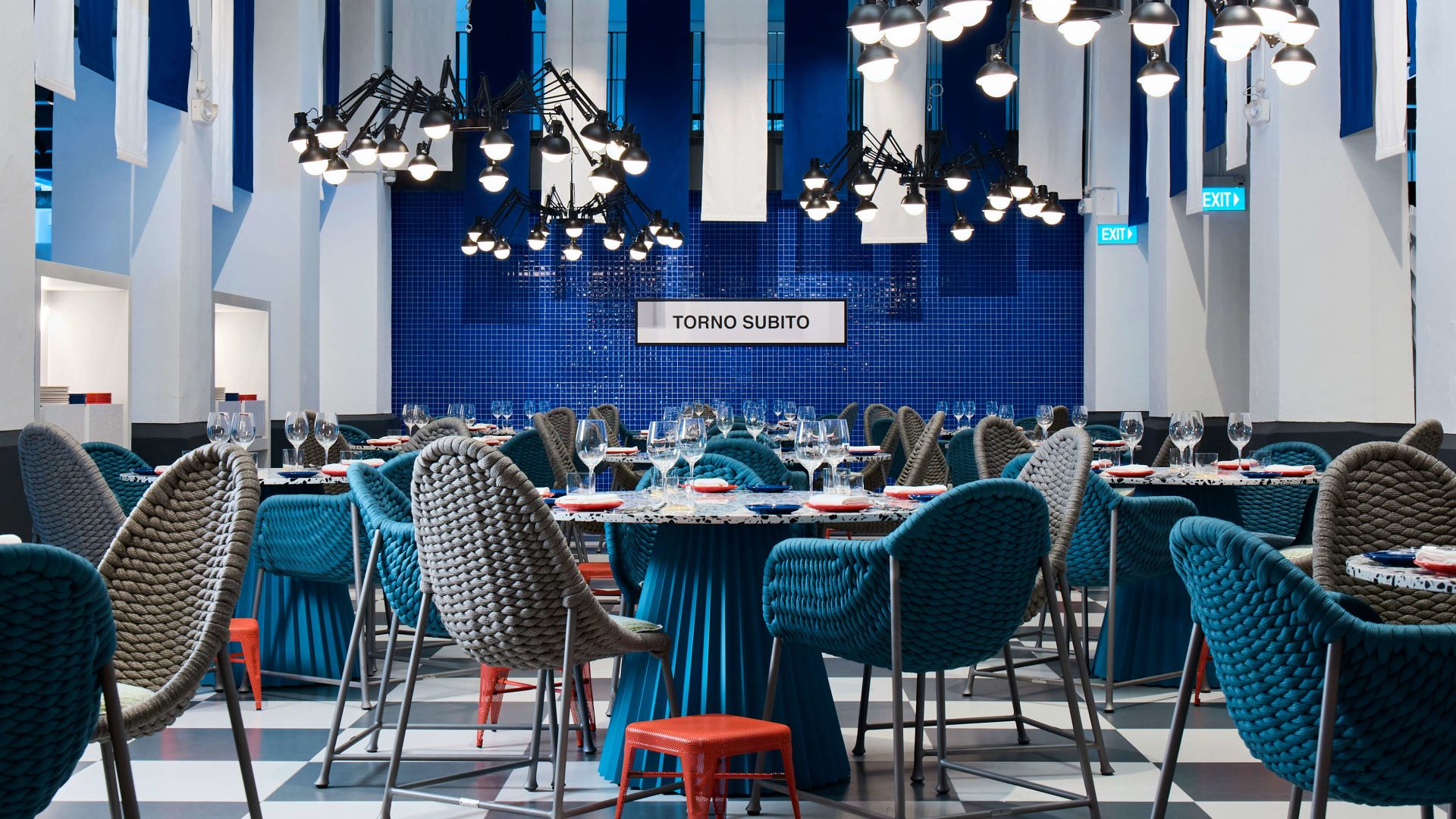 A Room With Tables And Chairs
