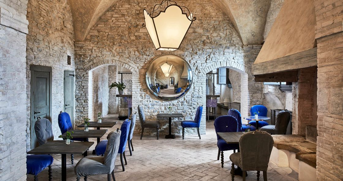 A Room With Tables And Chairs