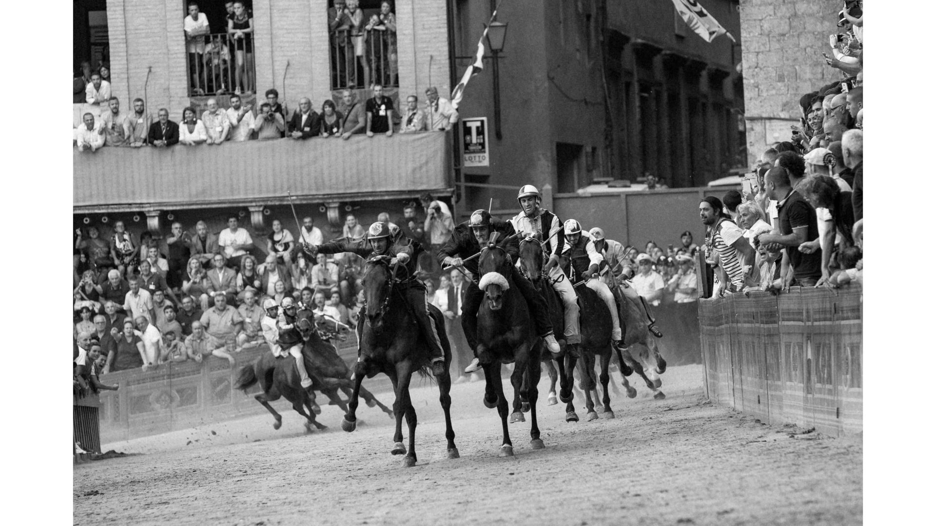 A Group Of People Riding Horses