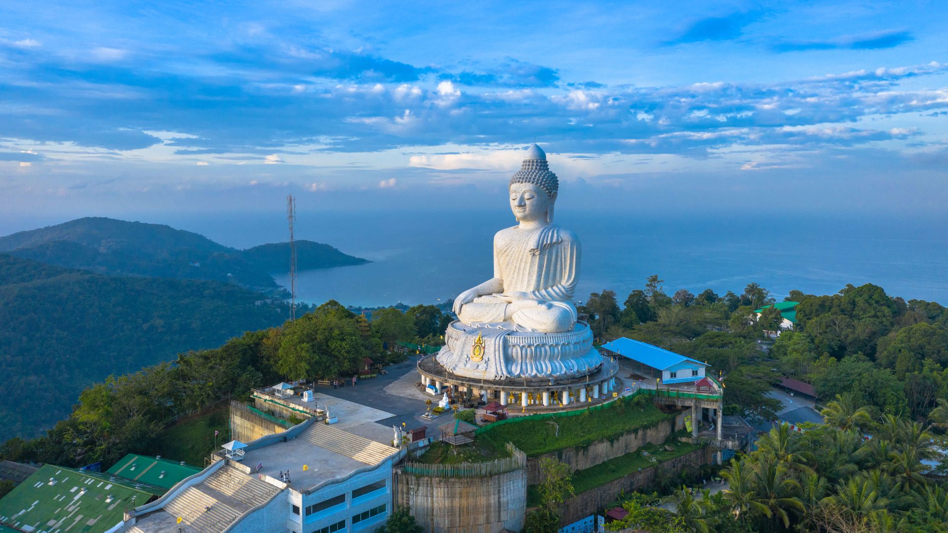 A Large Statue On A Hill