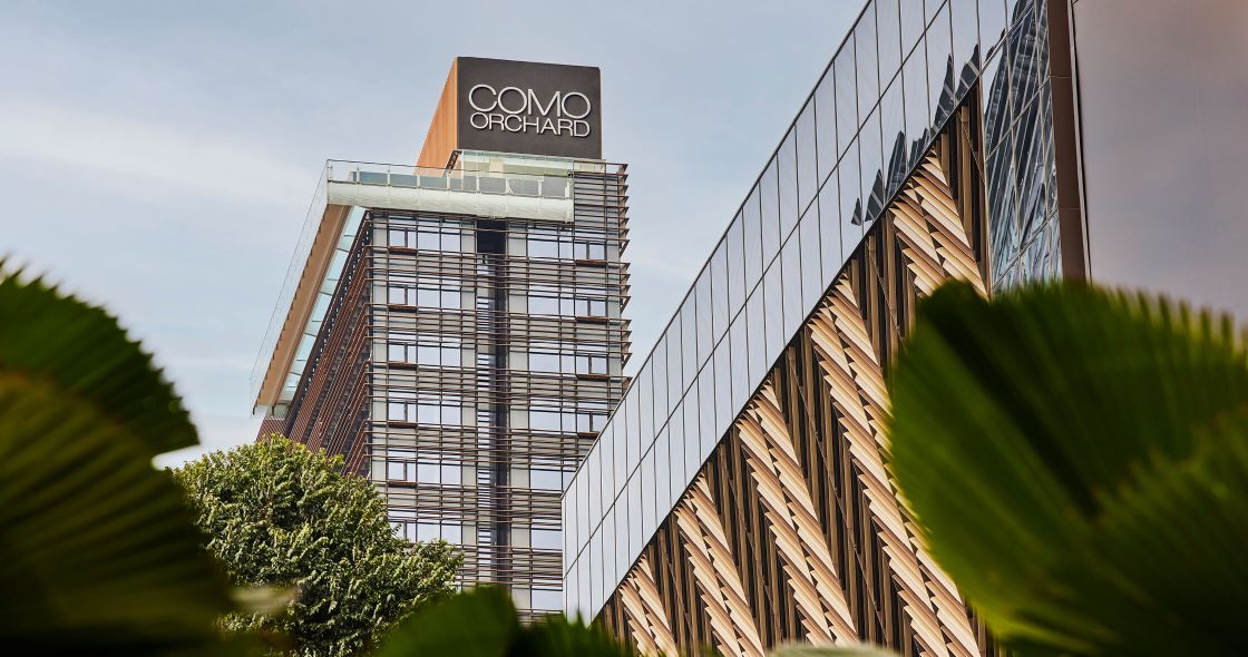 A Tall Building With A Sign On It