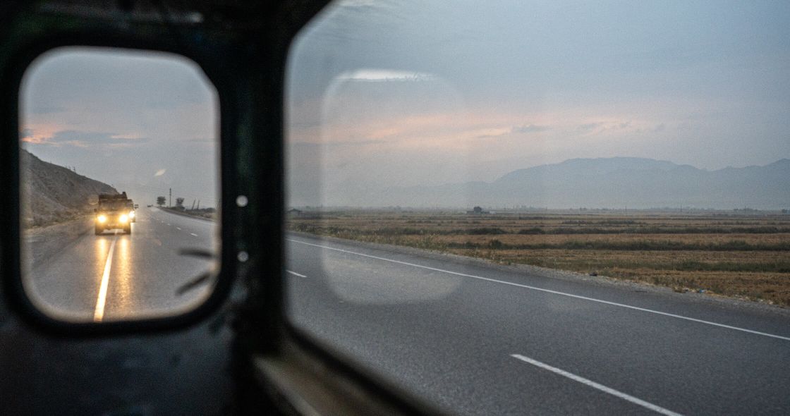 A Car Driving On A Road