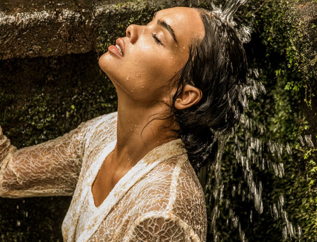 A Man With His Head In A Stream Of Water