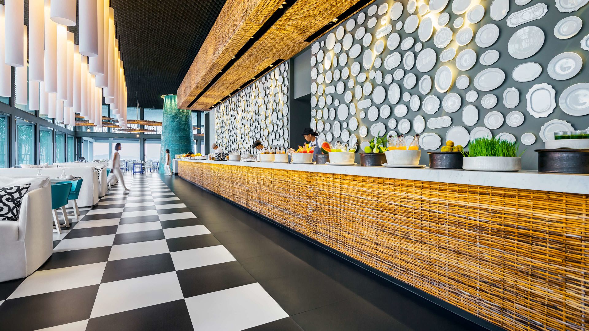 A Restaurant With A Bar And A Large Tile Floor