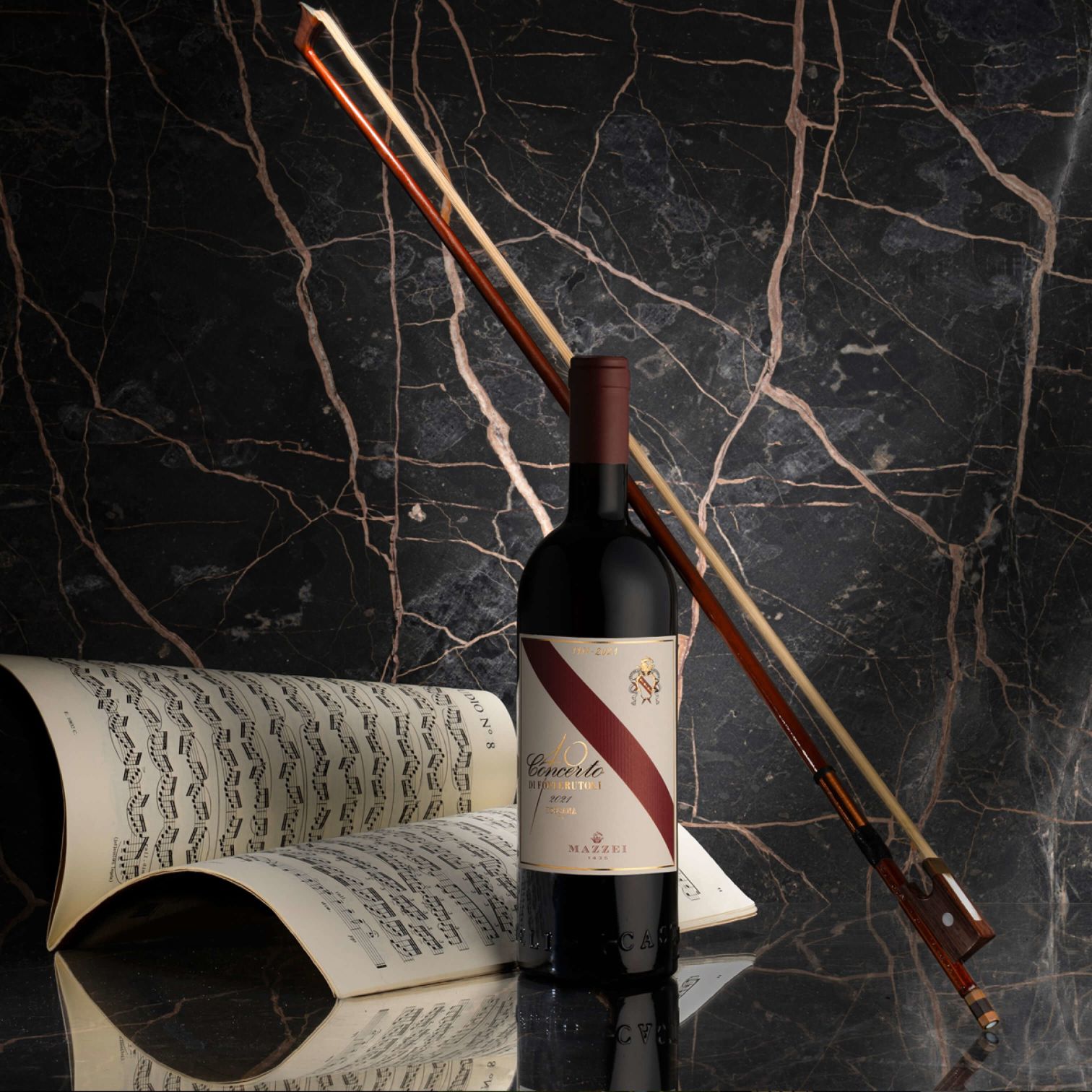 A Bottle Of Wine And A Book On A Map