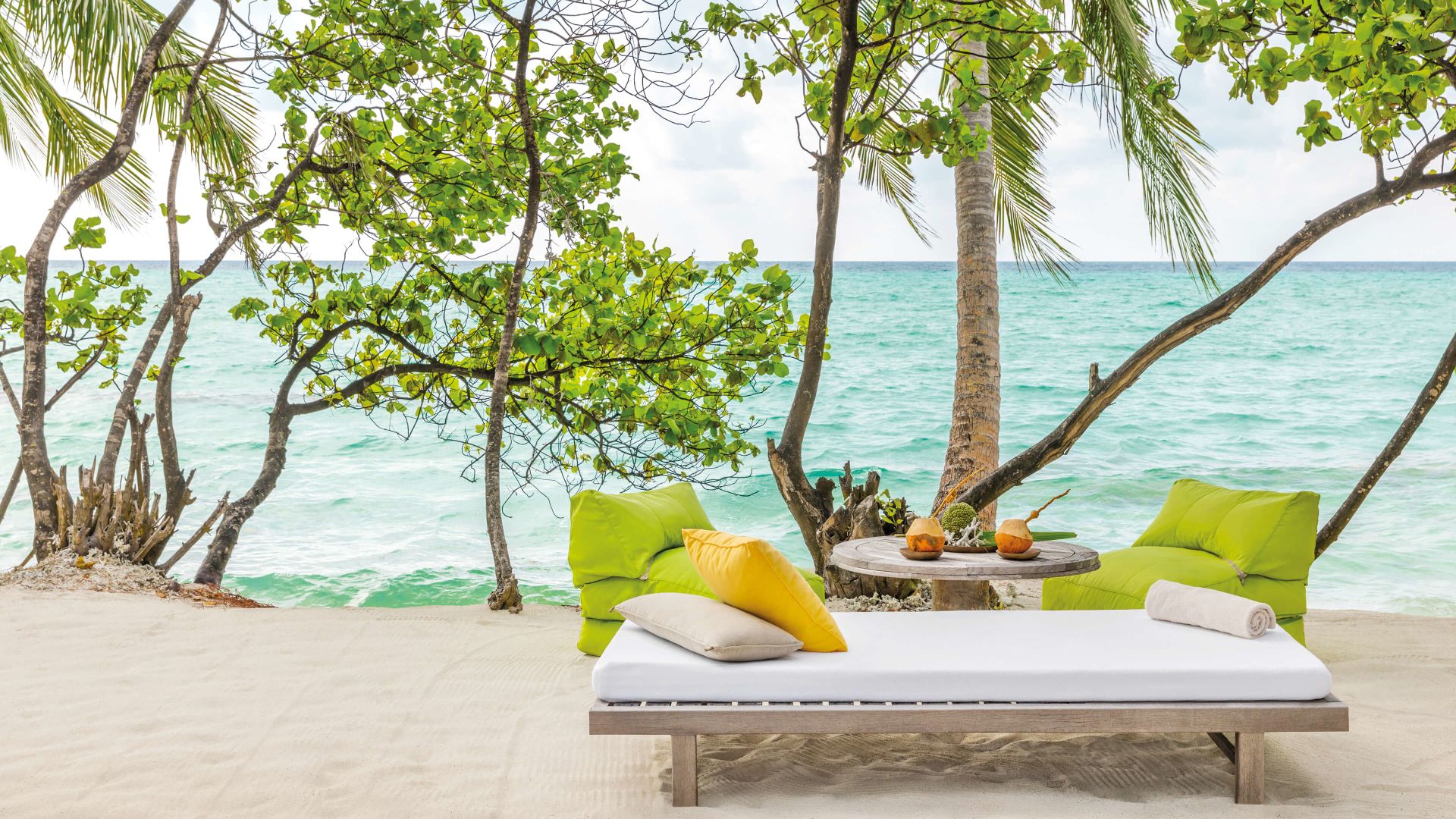 A Couch And A Table By The Water