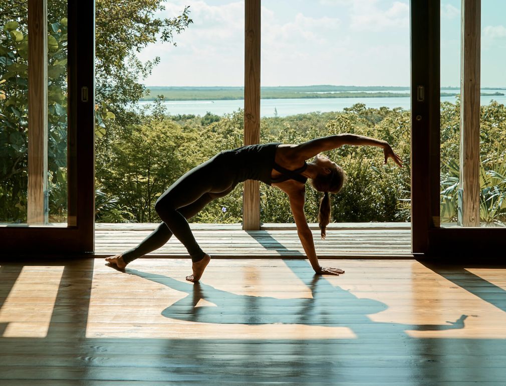 A Person Doing Yoga In A Room