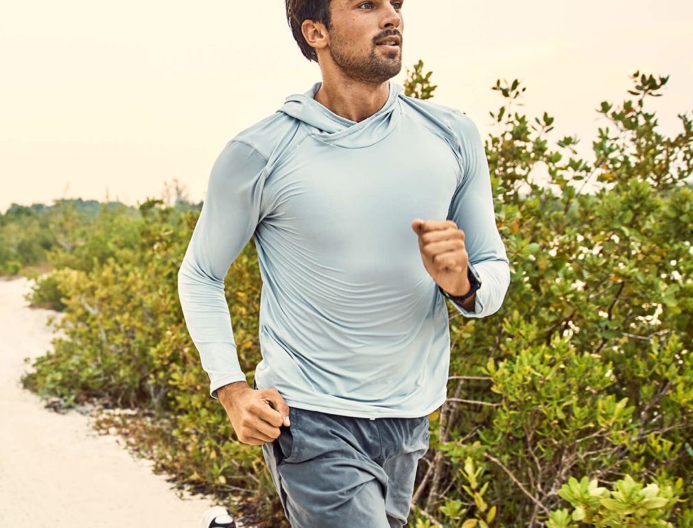 A Man Running On A Path