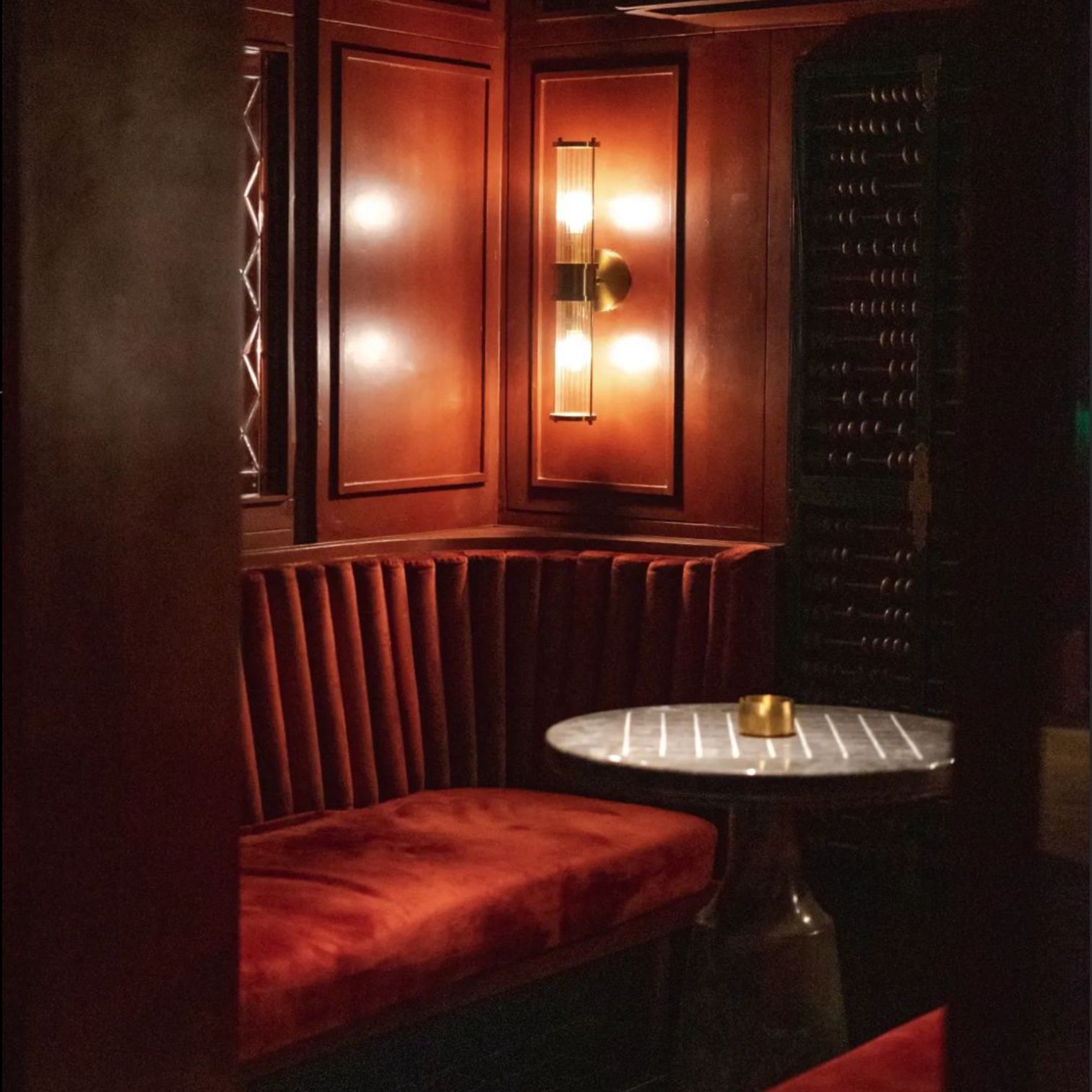 A Room With A Table And A Bench