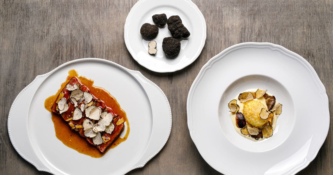 A Group Of Plates With Food On It