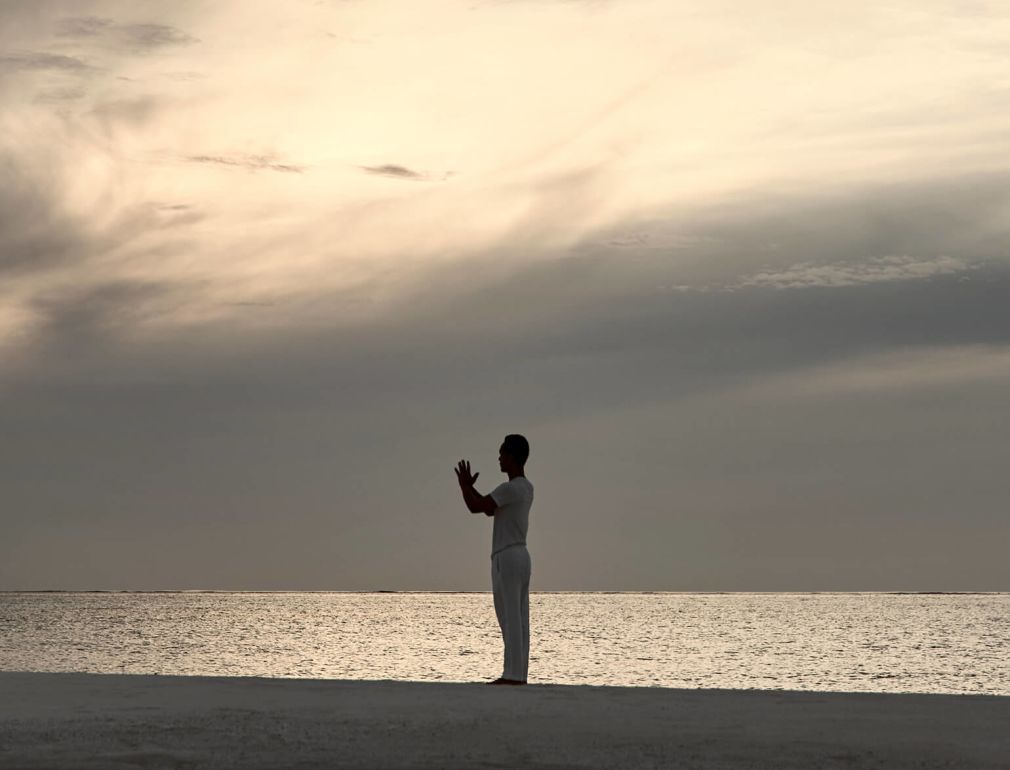 A Person Standing On A Beach