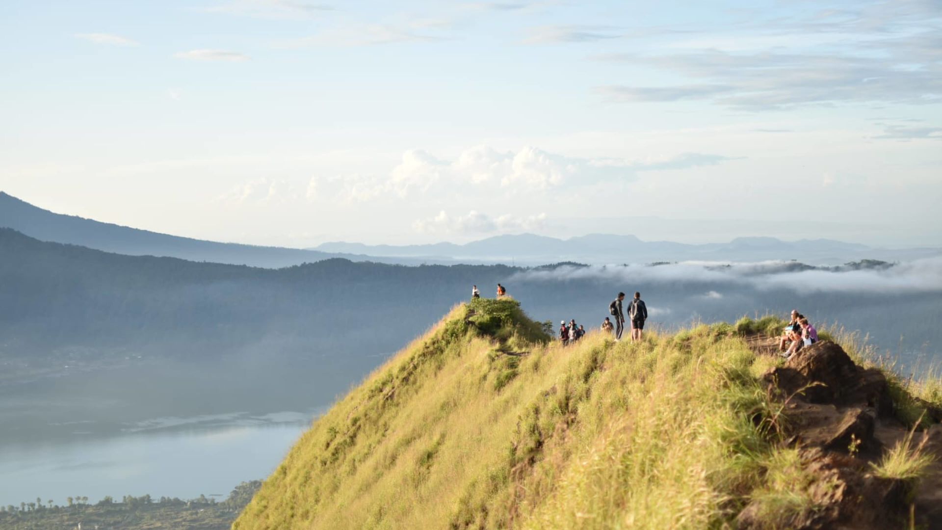 A Group Of People On A Mountain