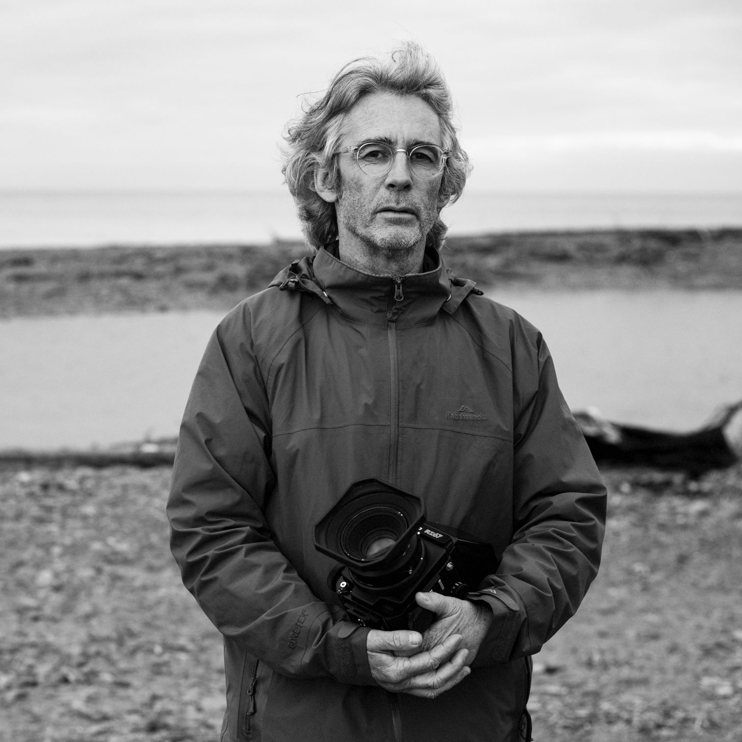 A Man Holding A Camera