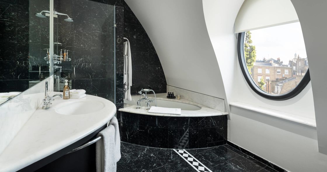 A Bathroom With A Large Window