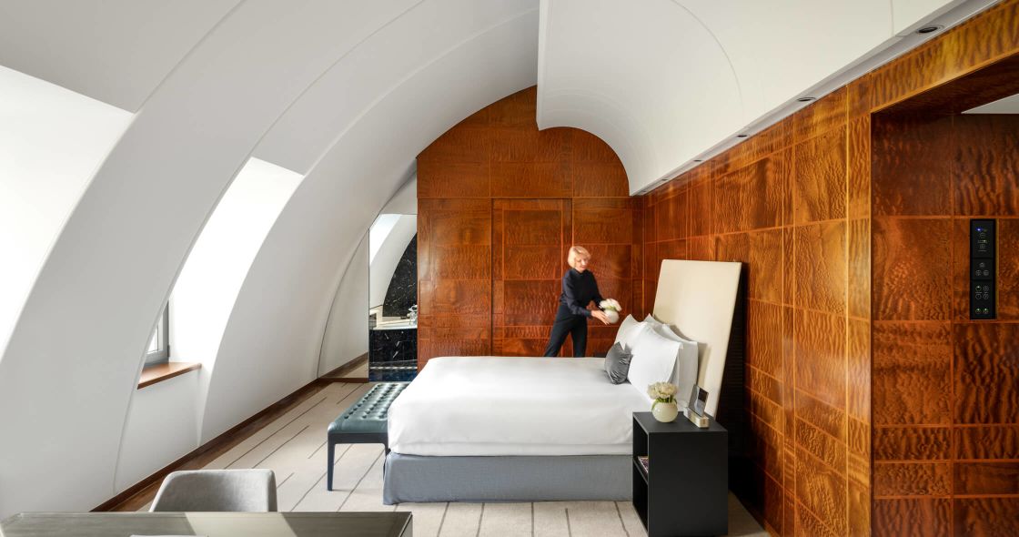 A Person Sitting On A Bed