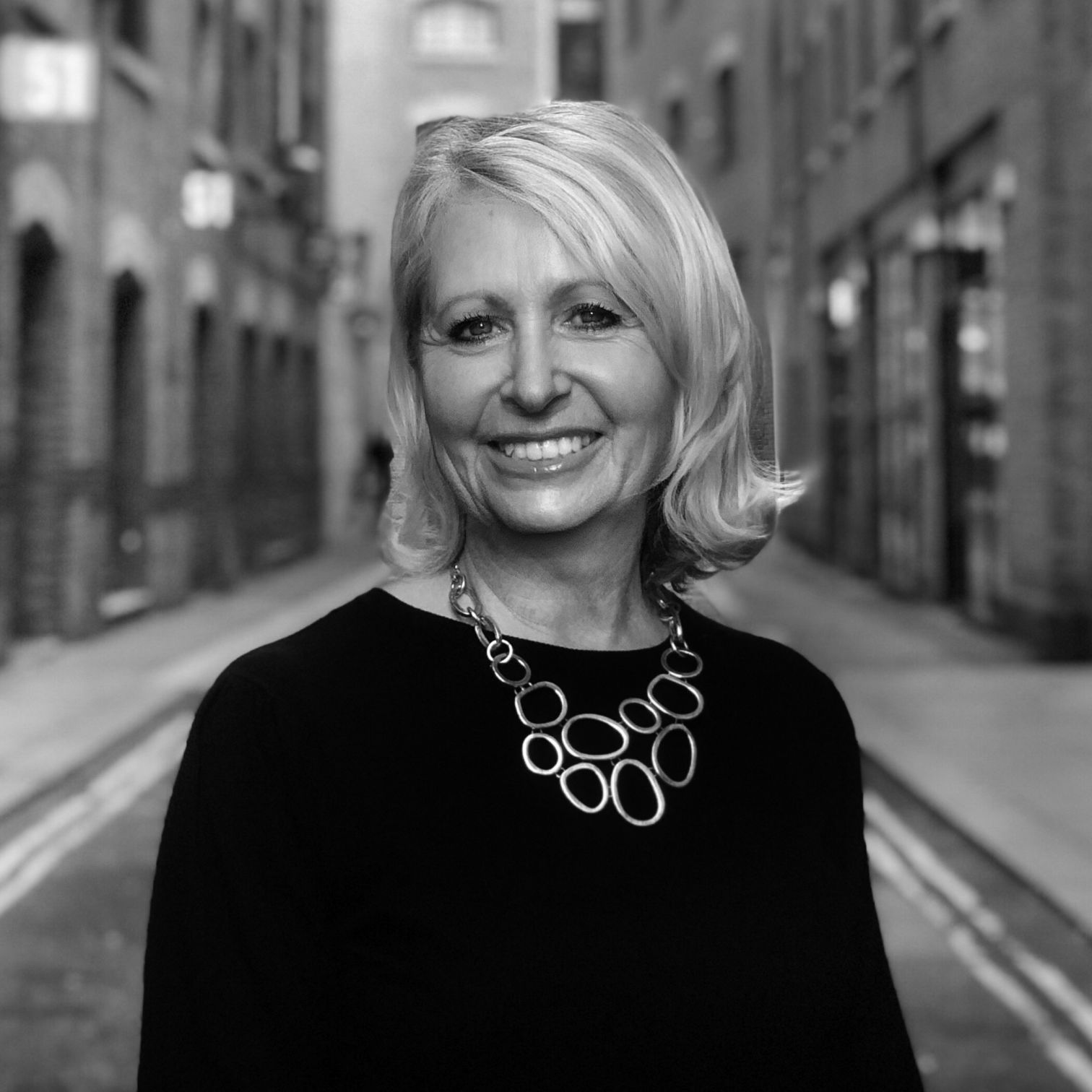 A Woman Smiling For The Camera