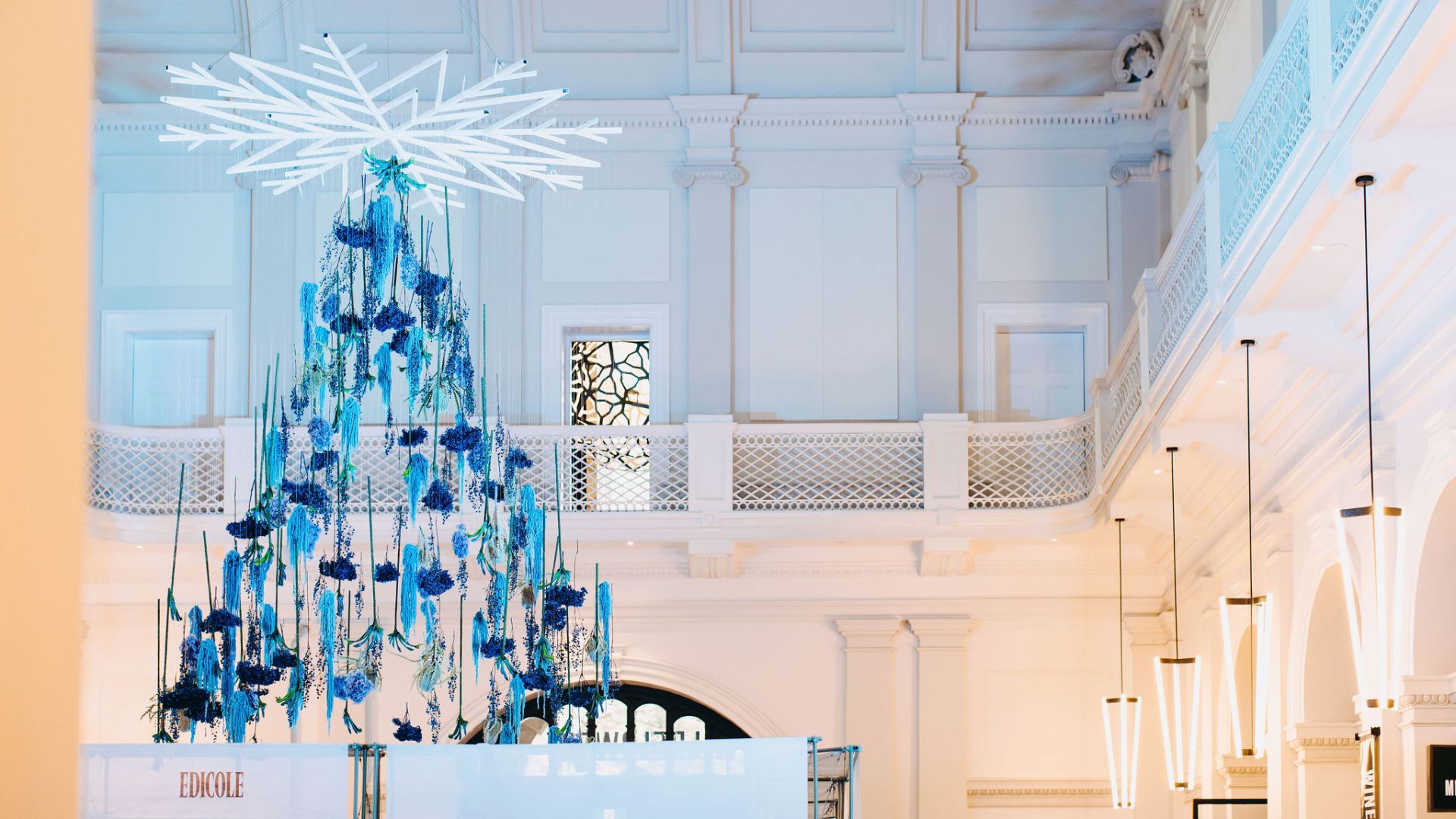 A Room With A Chandelier And A Large Chandelier