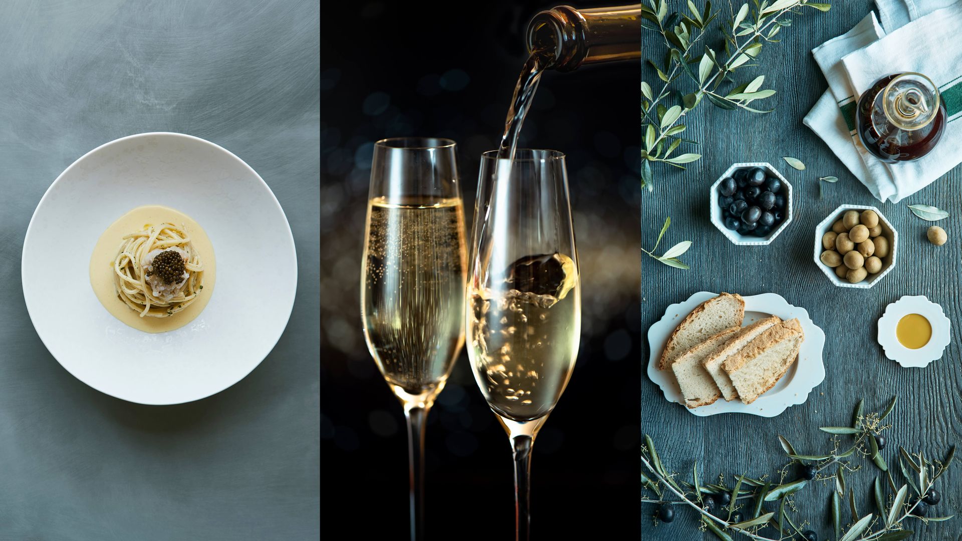 A Table With Plates And Glasses Of Wine
