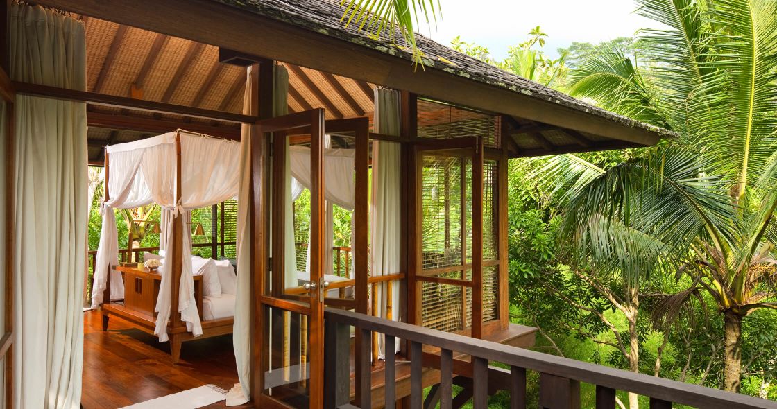 A House With A Deck And A Hammock