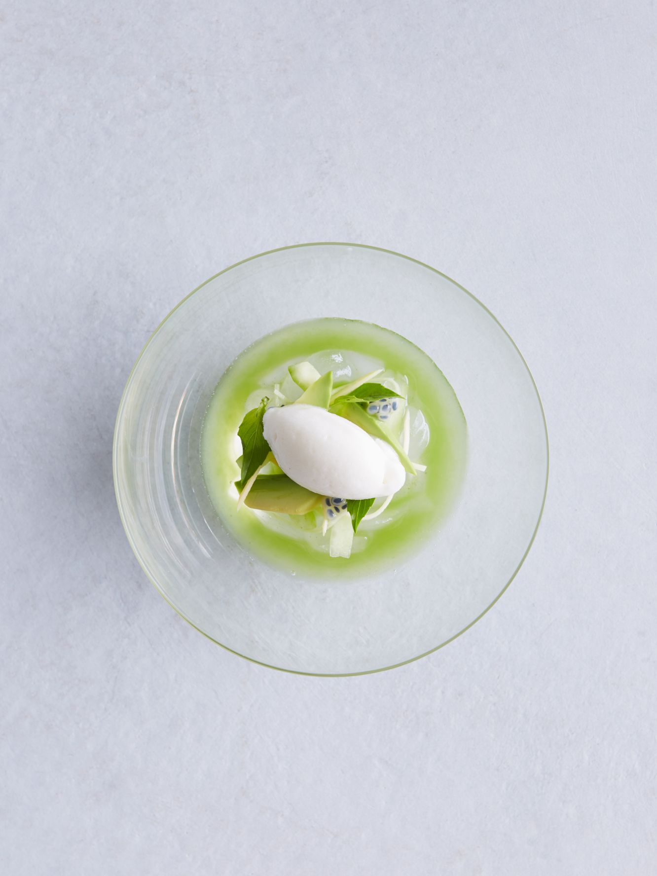 A Green Frog In A Glass Bowl