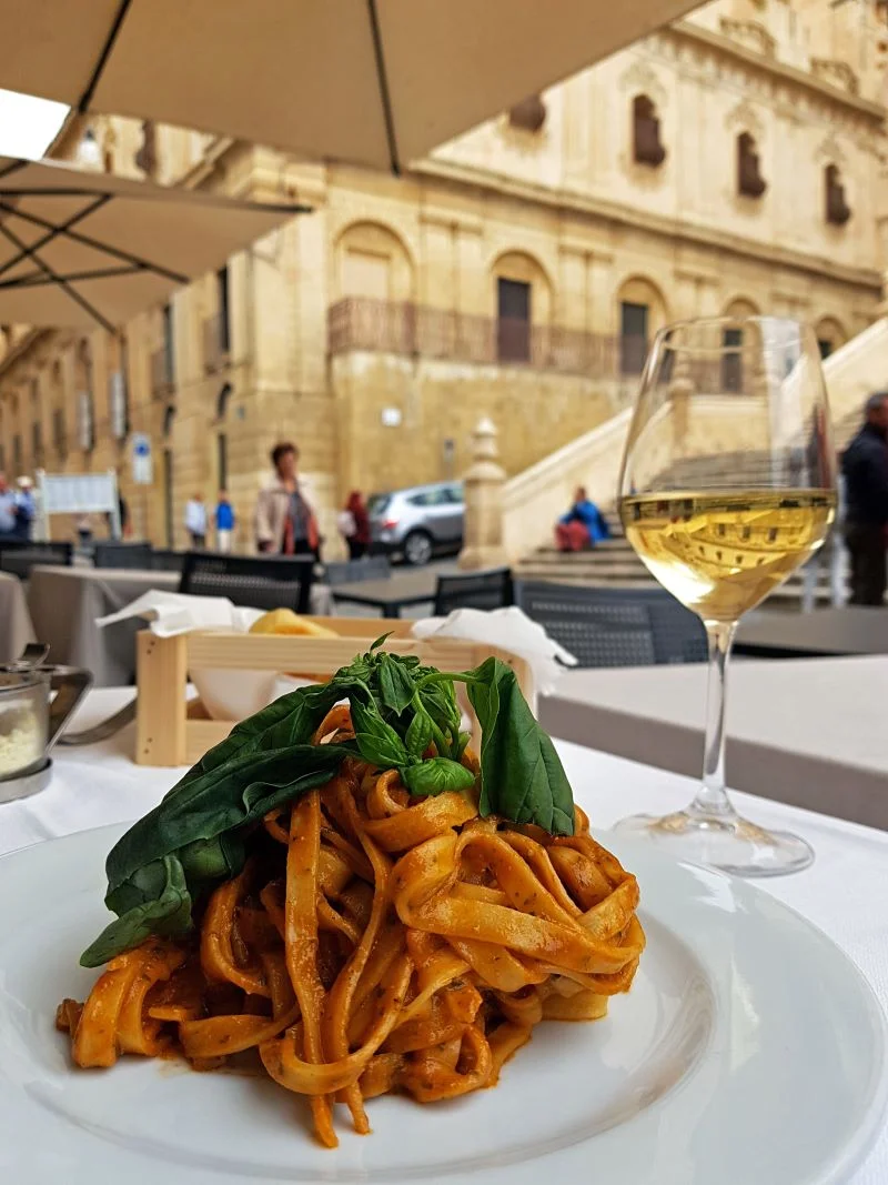 Tagliatelle with a glass of white wine