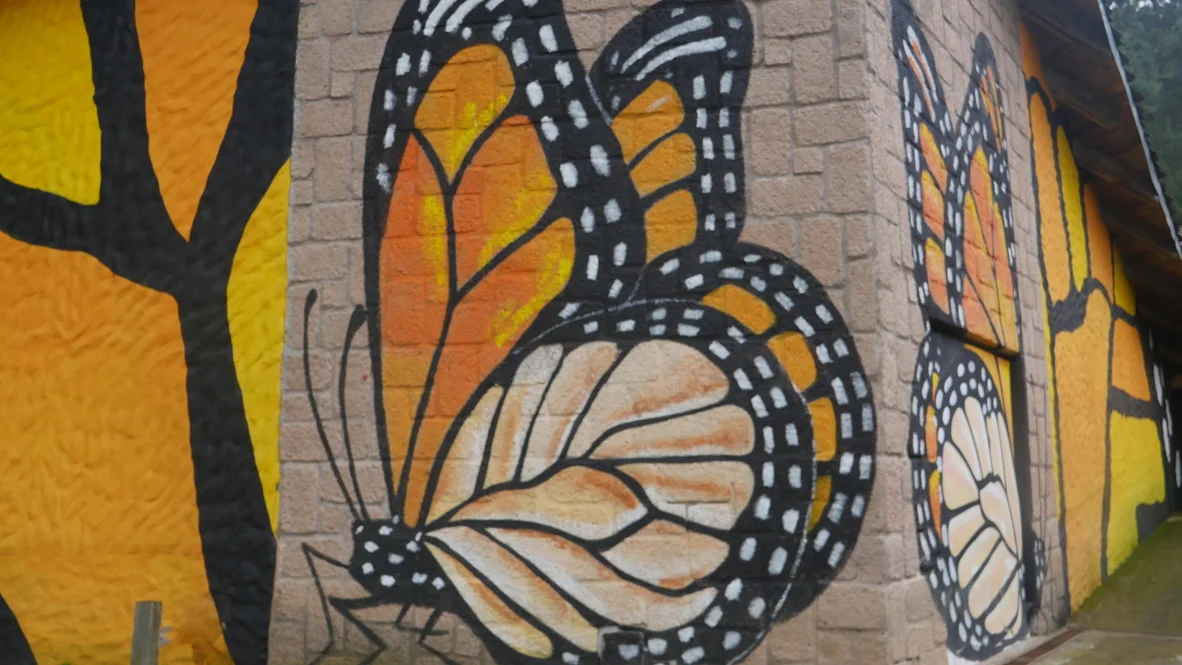 A mural depicting monarch butterflies
