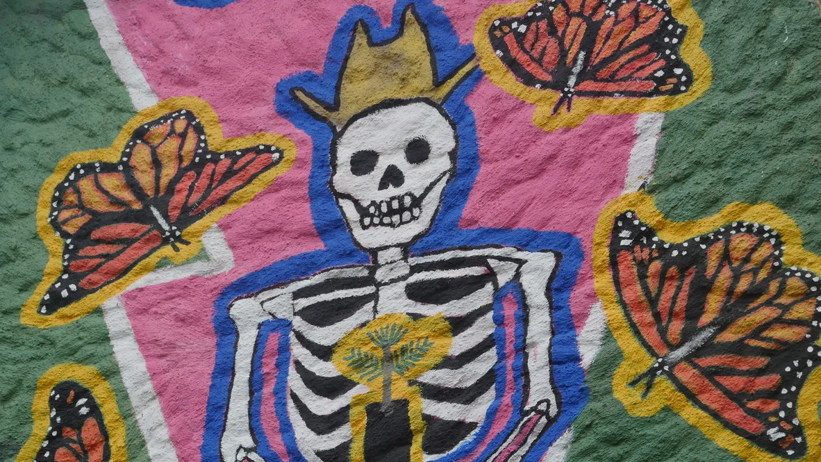 A mural symbolising the relationship between monarch butterflies and the dead